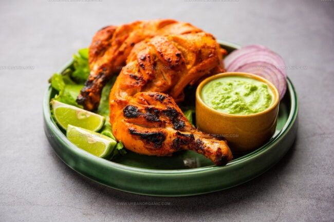 How Do North and South Indian Poultry Dishes Differ in Flavor and Technique?